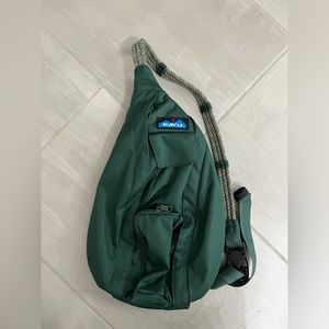 Kavu sling bag. Small. Hunter green. Very good used condition.
